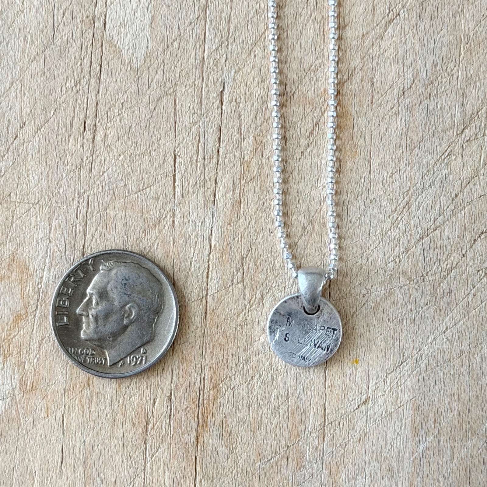 Silver Round FUCK Necklace Margaret Sullivan