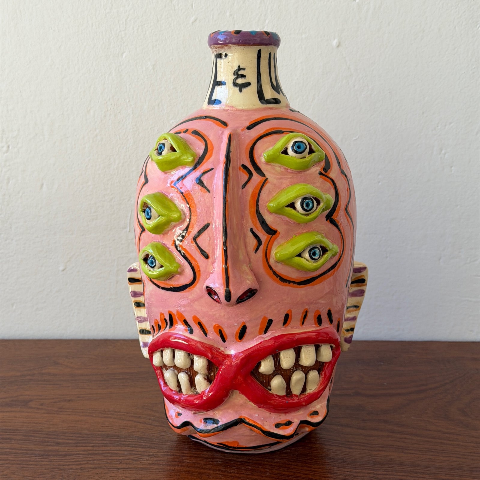 Pink 6 Eyes 2 Mouths