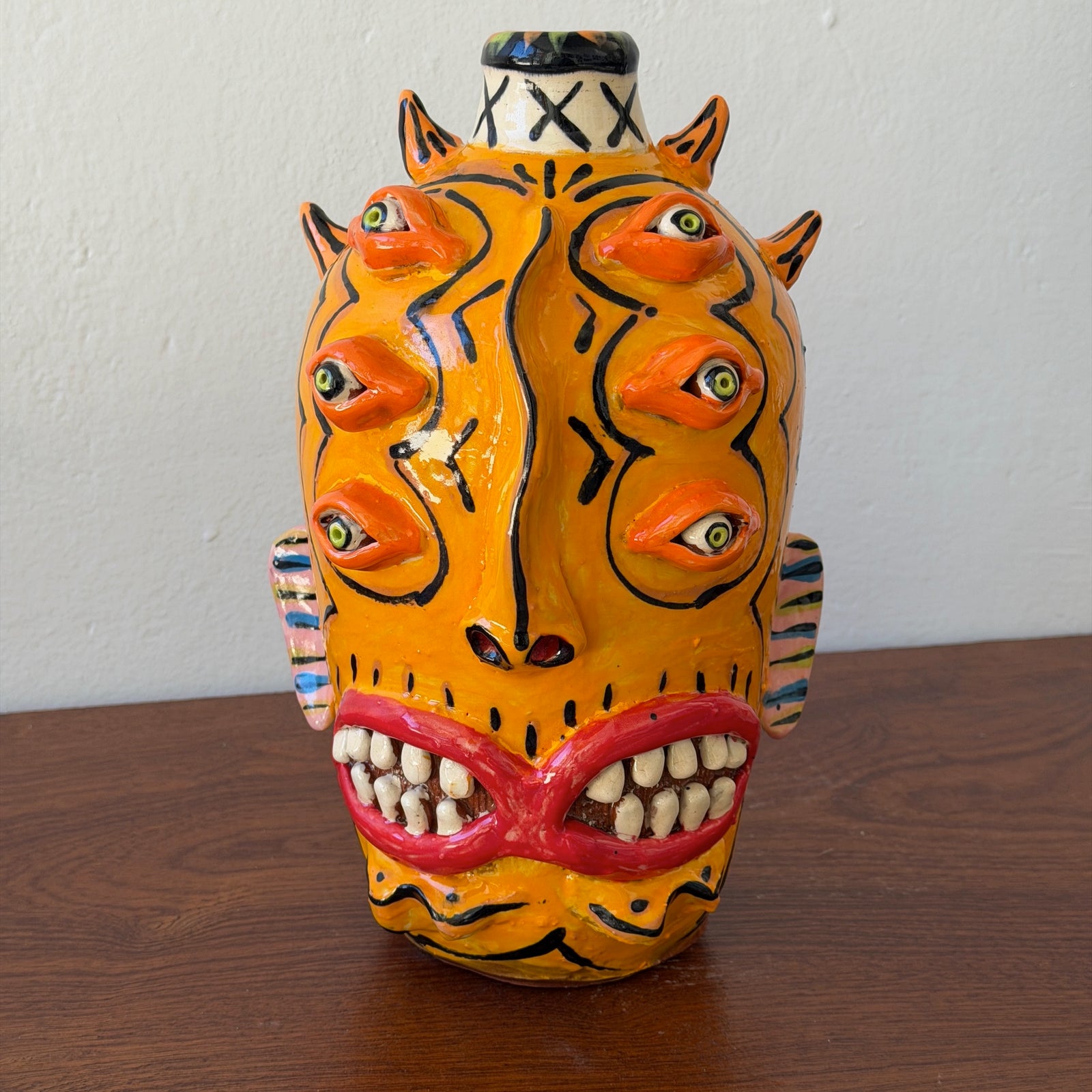 Orange 6 Eyes 2 Mouths