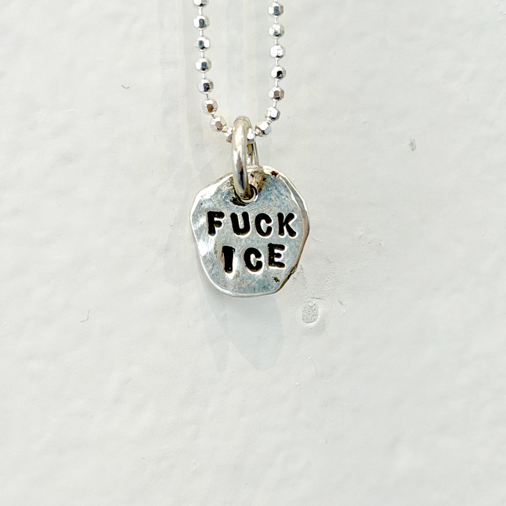 Tiny Fuck Ice Necklace, by Margaret Sullivan at Yard Dog Art